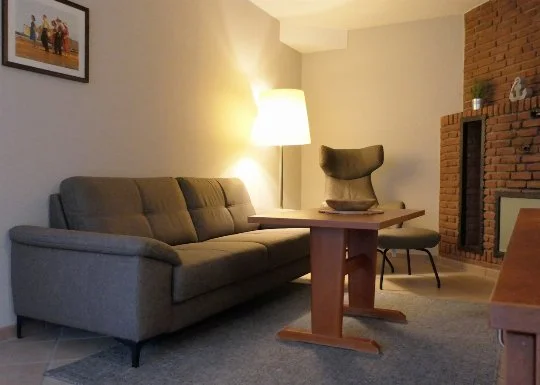 Wohnzimmer in einer 4-Personen-Ferienwohnung im Appartementhaus Godewind in Duhnen